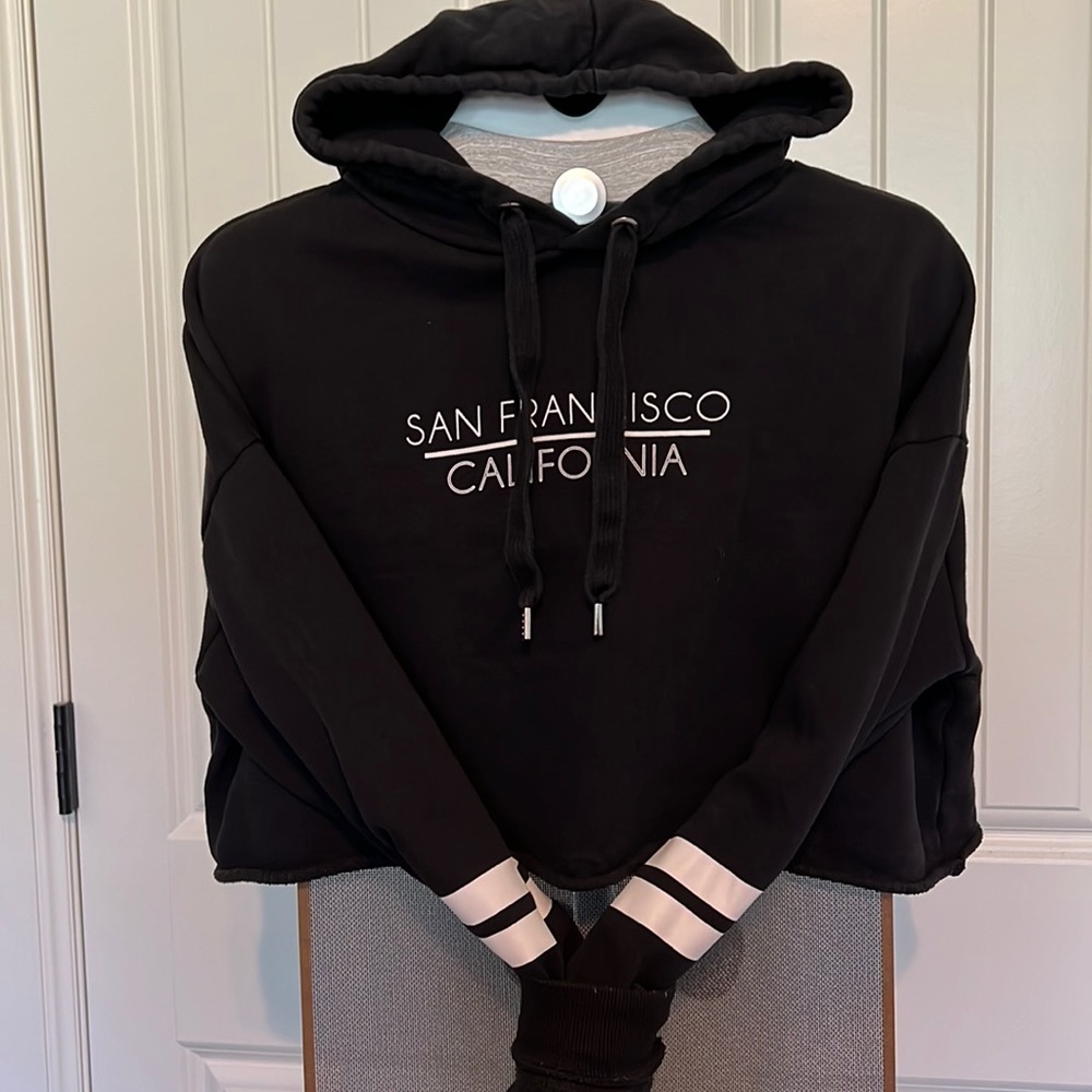Black with white sleeve detail hoodie.